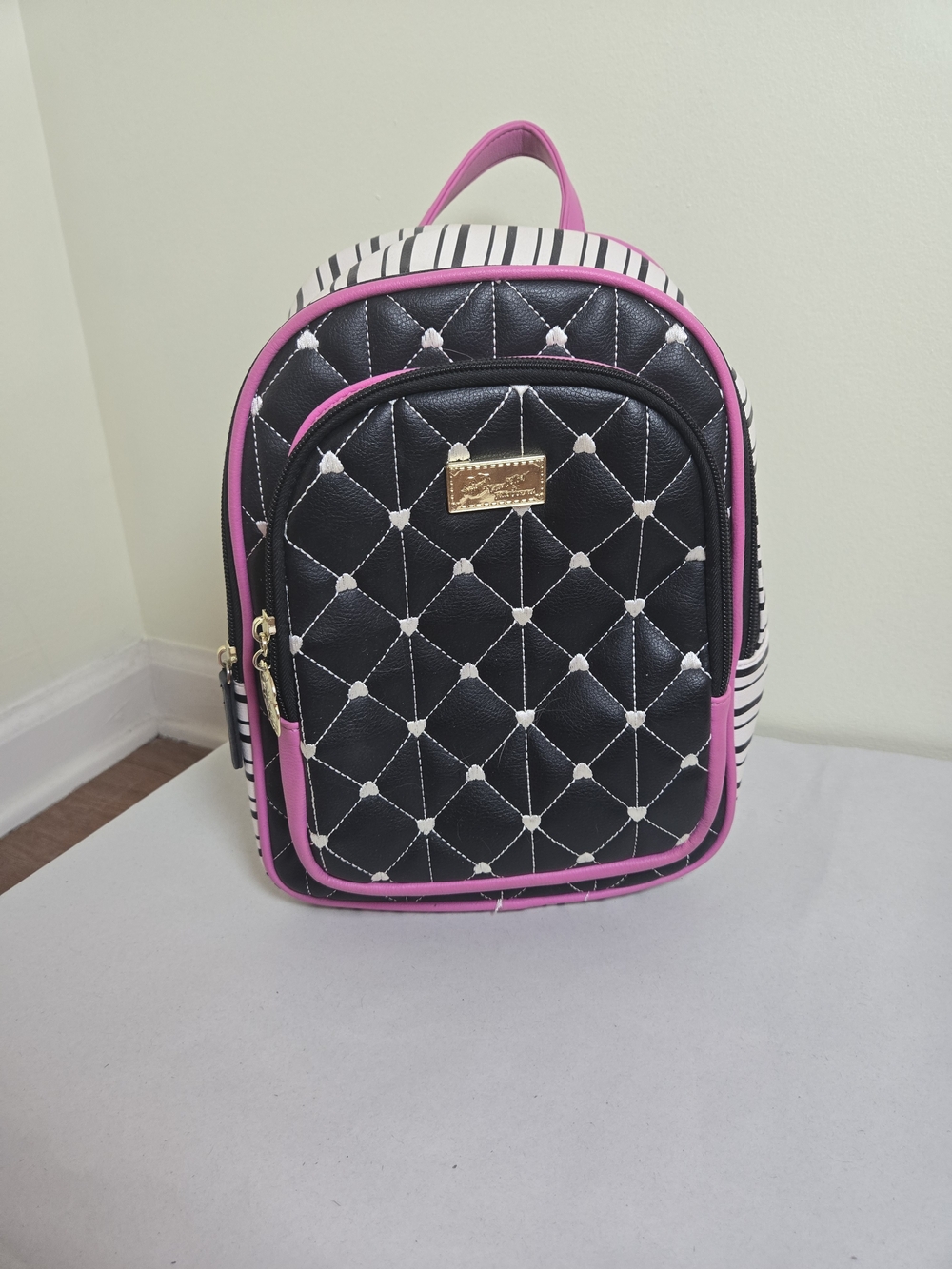 Betsey Johnson Black Quilted Backpack with Pink Trim and Stripes
